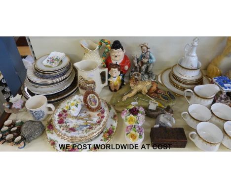 A quantity of decorative ceramics to include miniature Doulton character jugs, Clarice Cliff etc 
