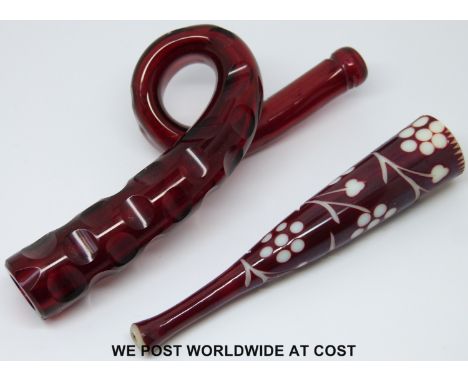 Two 19thC ruby cut glass cheroot holders one of looped form