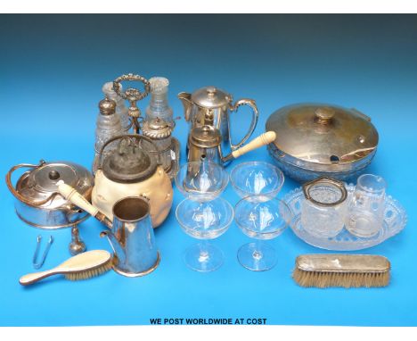A Royal Worcester biscuit barrel, a four-bottle cruet (one hallmarked silver mounted), milk and coffee pots, various plated a