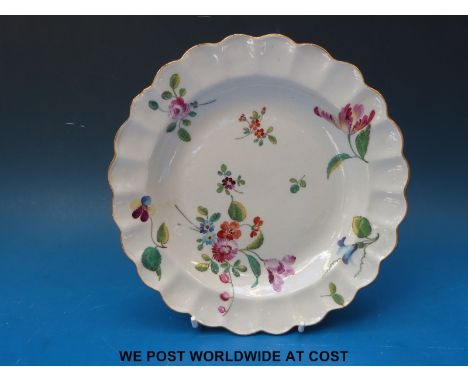 A Worcester early Dr Wall, James Giles decorated plate circa 1765, decorated with divergant tulip, scarlet pimpernel, auricul