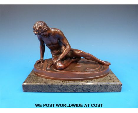 A bronze of a defeated slave gladiator fallen to the ground with broken sword, mounted on marble plinth (19cm x 11cm x 14cm)