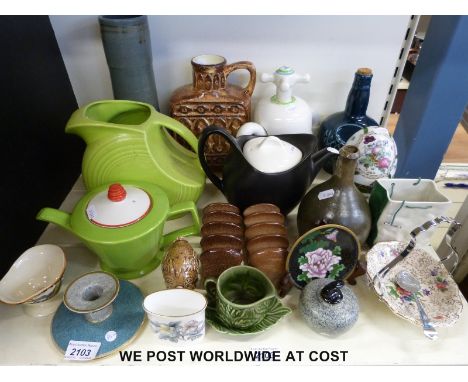 A quantity of collectable ceramics to include Carltonware, Harrods ceramic bag, Sadler Art Deco teapot, Baxter studio pottery