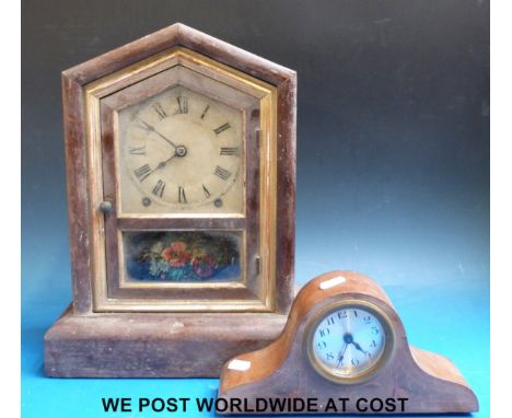 An American mantel clock chiming on a gong with two train movement together with a small Edwardian Napoleon hat style clock 