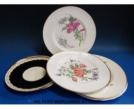 A collection of hand decorated Royal Worcester plates with botanical scenes, signed B. Cox