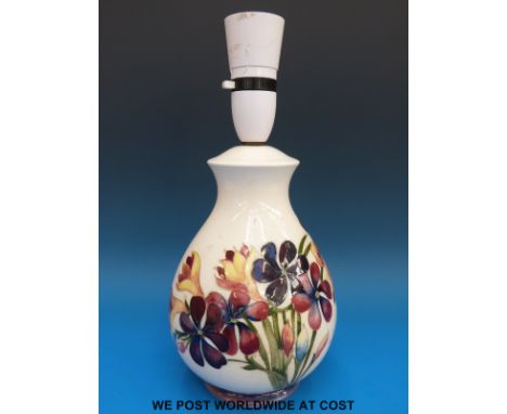A Moorcroft lamp in Freesias pattern (28cm with fitting) 