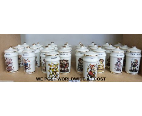 Twenty-four Goebel Hummel herb and spice jars together with matching salt and pepper shakers 