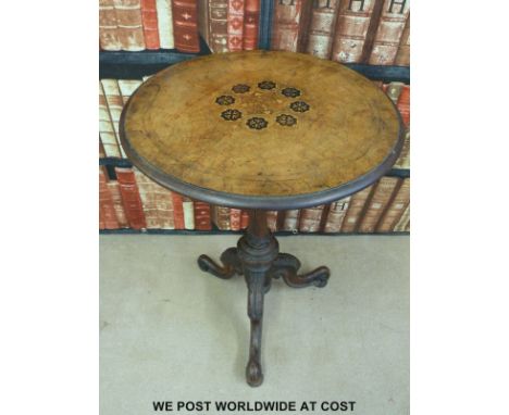 A Victorian burr walnut inlaid occasional table raised on carved tripod base and column (diameter 52cm, H70cm) 