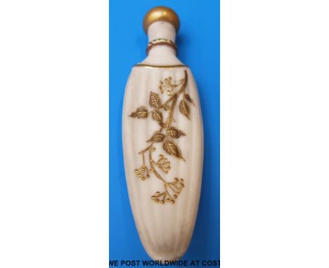 A Royal Worcester scent bottle with gilt decoration of foliage, puce stamps (9cm high)