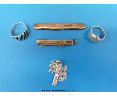 A silver chain and pendant set with pink quartz, hallmarked silver pen knife, hallmarked silver button hook and two silver ri