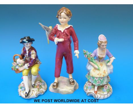 A Royal Worcester 'Parakeet' figure and two Dresden figures 