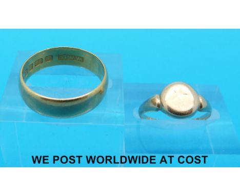 A 22ct gold wedding band (5g, size N) an 18ct gold signet ring (2.5g, size K)