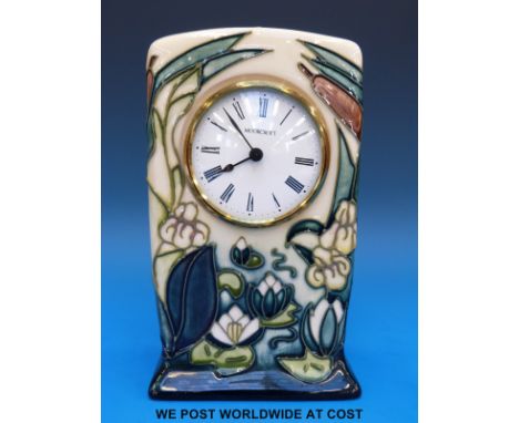 A Moorcroft mantel clock in the Lamia pattern (15cm tall)