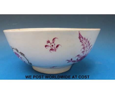 An early Worcester 'Dr Wall' period bowl, painted in puce monochrome with stylized plant sprigs, some enclosed by gold rococo