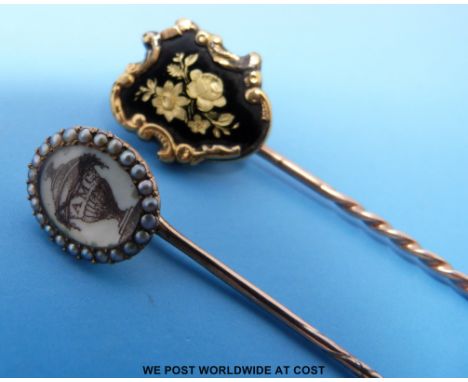 Two 19thC stick pins, one decorated with an urn with initials A.M.C surrounded by seed pearls and the other with black enamel