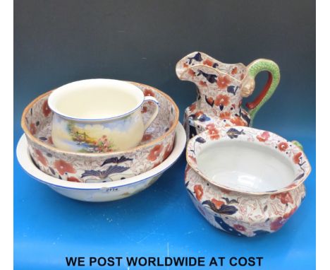 A Masons style ironstone jug and basin, chamber pot and two pieces of Falconware 