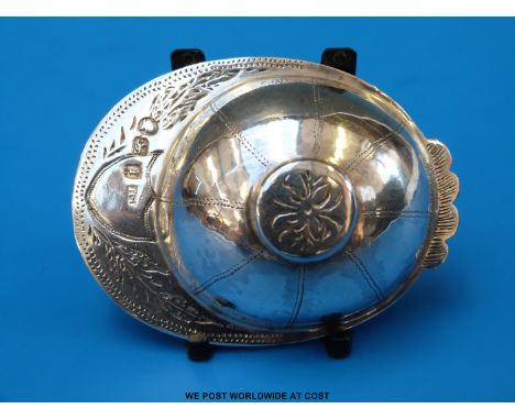A Georgian hallmarked silver novelty caddy spoon formed as a jockey's cap. London 1804, maker Thomas Meriton, length 7.5cm (2