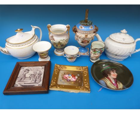 A collection of ceramics including 18thC English teapots, a Rockingham style plaque, Delft tile, Dresden lamp etc