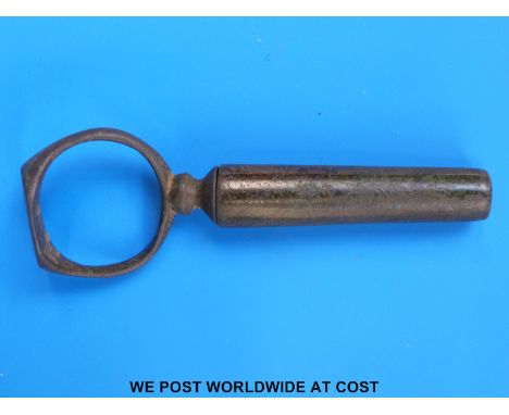 A post-medieval combination tool including pipe tamper, corkscrew etc (72mm)