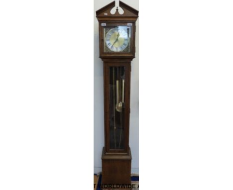 An oak effect longcase clock with brass weights and silvered dial (height 190cm)