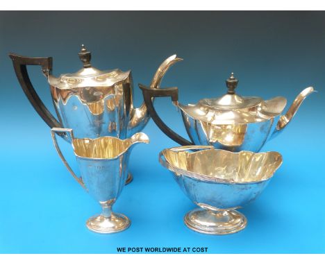 A hallmarked silver four piece tea service. Birmingham 1912, maker I S Greenberg & Co, height of coffee pot 24.5cm (1486g all