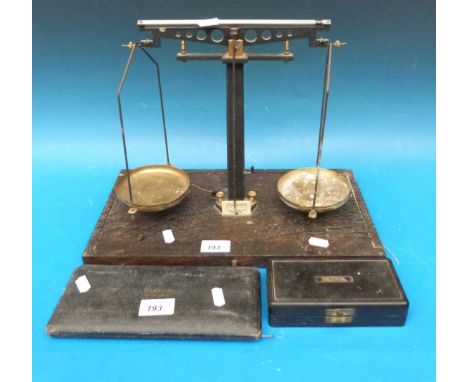 A set of Philip Horns scales with weights and a cased drawing set 