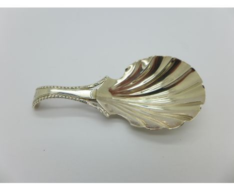 A white metal caddy spoon, hallmark worn