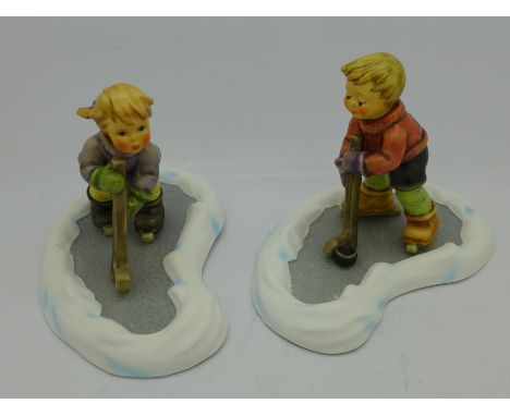 Two Goebel Hummel figures, Let's Take To The Ice and Season's Best, with stands and boxes