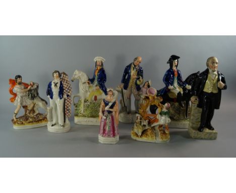A group of Staffordshire pottery figures, mostly 19th century, to comprise models of Samson and the lion, Queen Victoria, a g
