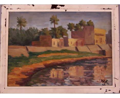 Manner of Sir Winston Churchill- North African view of houses by a pool; oil on canvas laid down on board, bears initials and