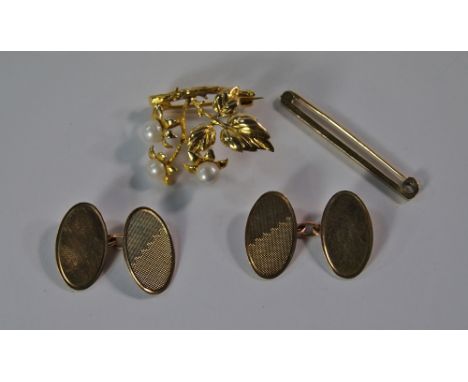 A 9ct gold and pearl set brooch of branch and leaf form, approx 3cm wide, together with a pair of 9ct gold gentlemen's cuffli