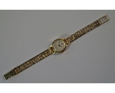 A Ladies Tissot wrist watch fitted with a 9ct gold bark effect bracelet strap.
Note: Sold on behalf of St. Christopher's Hosp
