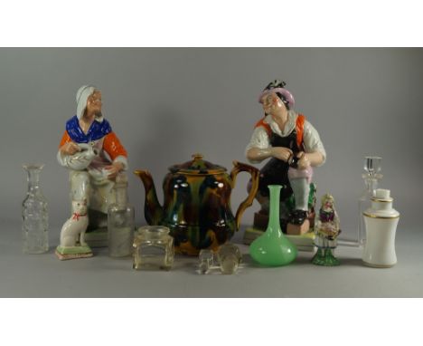 A pair of Staffordshire figures depicting Cobbler Jobson and his wife Nell, after John Hall, 19th century, 29.5cm high ea: to