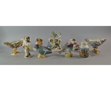 A pair of Sizzendorf porcelain models of doves, late 19th/20th century, together with two Continental porcelain salts in the 