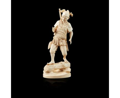 Y IVORY OKIMONO OF A HUNTER MEIJI PERIOD&nbsp;明治 象牙雕人物置物 walking across a log, with a rifle placed over his shoulder, shells 