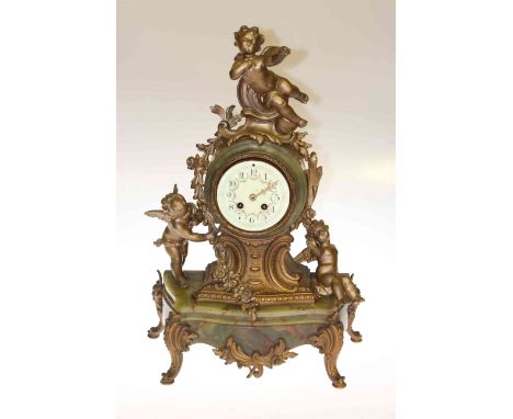 Ornate gilt metal and green onyx mantel clock