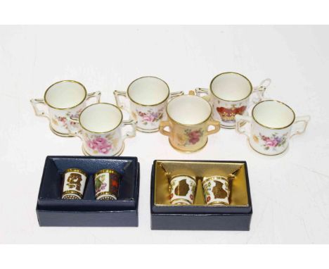 One Royal Worcester and five Royal Crown Derby miniature loving cups, four Royal Crown Derby and one Minton thimbles, some bo