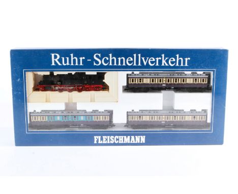 Fleischmann Zugpackung ”Ruhr-Schnellverkehr” 4887, Spur H0, 4-teilig, Alterungsspuren, im leicht besch. OK, sonst noch Z 2