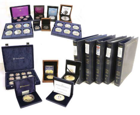 Assorted Commemorative Coins, Sets and First Day Covers; 5 albums of first-day stamp covers, some with reproduction coins, 4 