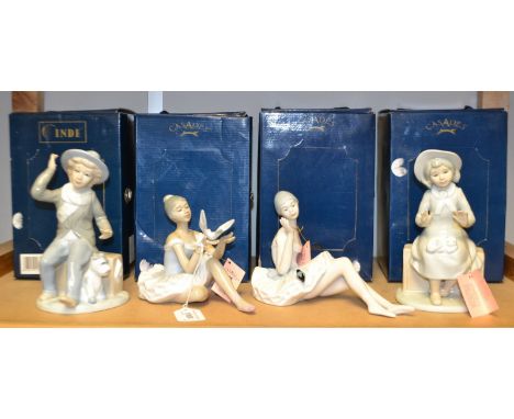 A Spanish porcelain ballerina figure by Casades, boxed; three others, similar (4)