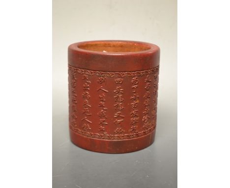 A Chinese bamboo brush pot, red body, character script panel
