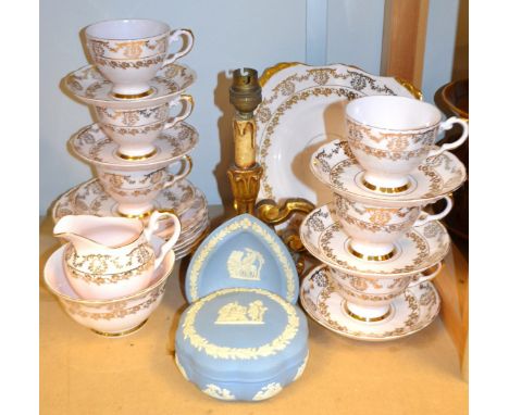 A Staffordshire Tuscan china tea set for six, milk and sugar, bread and butter plate; a Wedgwood trinket dish, powder bowl an