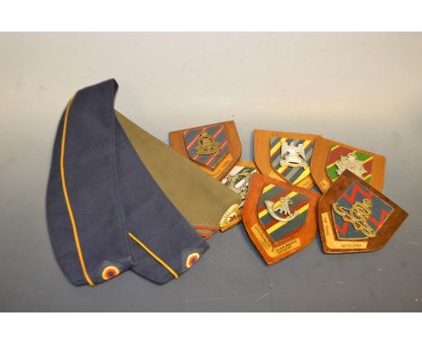 A Russian Soviet cap; others; mounted badges, Oxfordshire and Buckinghamshire Light Infantry; Royal Scots; Gordon Highlander'