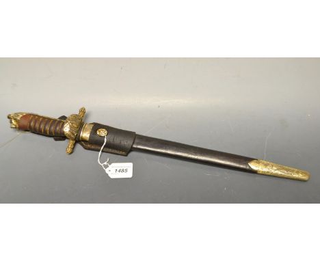 A large dagger with leather and metalwork scabbard