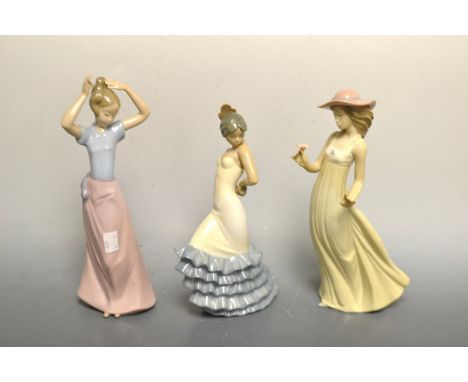 A Nao figure of a girl dressing her hair, boxed; another, Flamenco dancer, boxed; etc. (3)