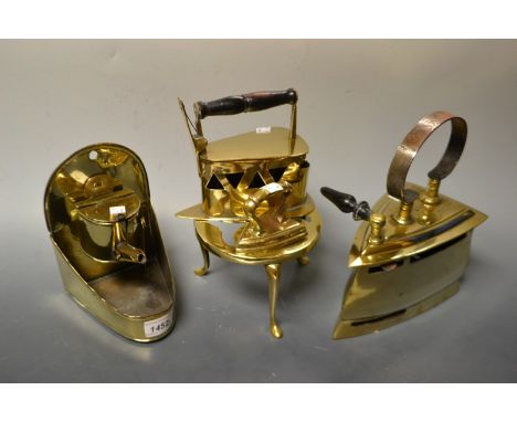 Brass ware - a Fagler Laszic Szecerle No 11 coal iron, loop handle;  another smaller;  a bulkhead oil lamp;   a trivet etc (5