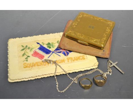 A 9ct gold ring; another, 4g gross; a 1930's powder compact, engine turned; a silver cross pendant on chain; two World War On
