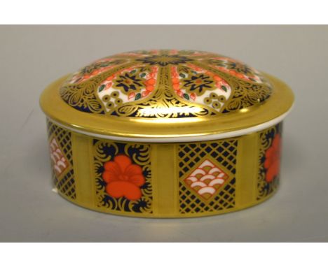 A Royal Crown Derby 1128 pattern oval trinket box and cover, solid band, printed mark, first quality