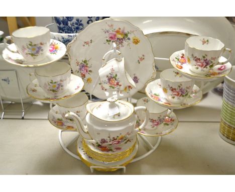 A Royal Crown Derby Posies tea set for six, comprising side plates, biscuit plates, cups and saucers, small teapot, cream jug