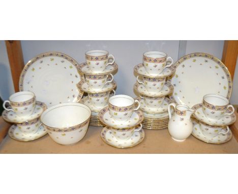An Edwardian Brown Westhead and Moore, Cauldon tea service for twelve, decorated with flowers, pattern No 1736,c.1904