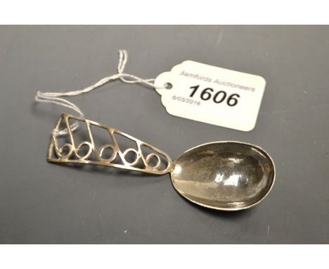 A silver caddy spoon, Birmingham 1953